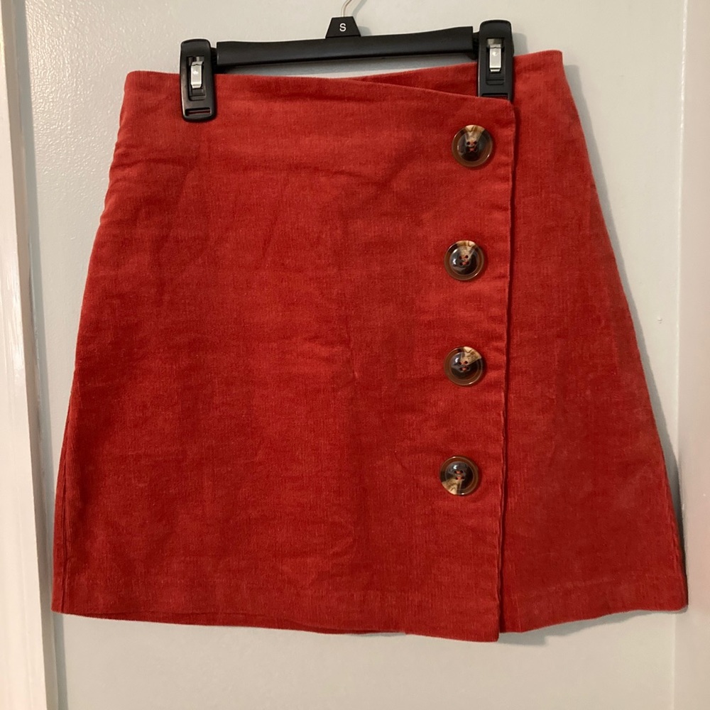 “Miami” Size Small Mini Skirt ( Rust ) Buttons In front Zipper In Back.